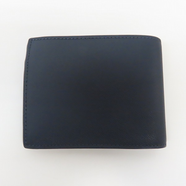実際に弊社で買取させて頂いたEMPORIO ARMANI/エンポリオ アルマーニ  二つ折り財布 キーリング ギフトセット ネイビーの画像 1枚目