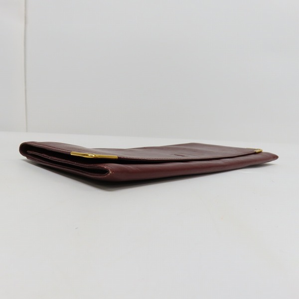 実際に弊社で買取させて頂いたCartier/カルティエ マストライン レザー 二つ折り長財布/クラッチバッグの画像 2枚目