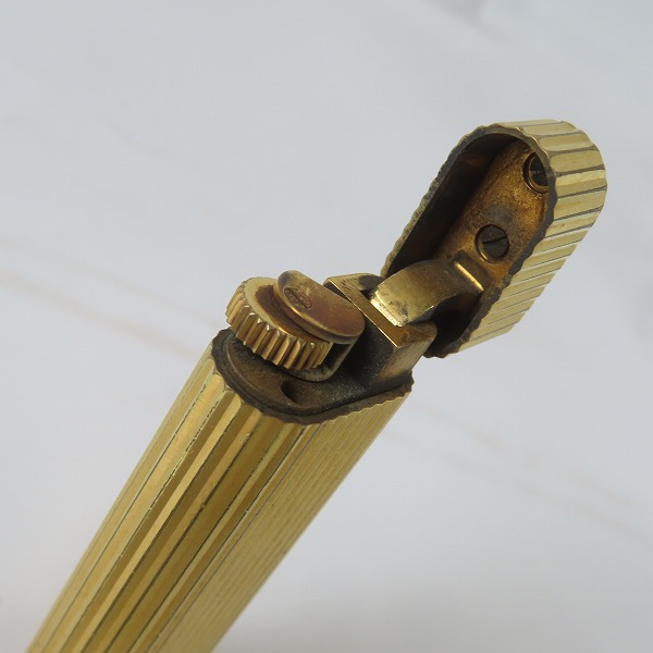 実際に弊社で買取させて頂いたCartier/カルティエ ガスライター ラウンド ゴールドカラーの画像 4枚目