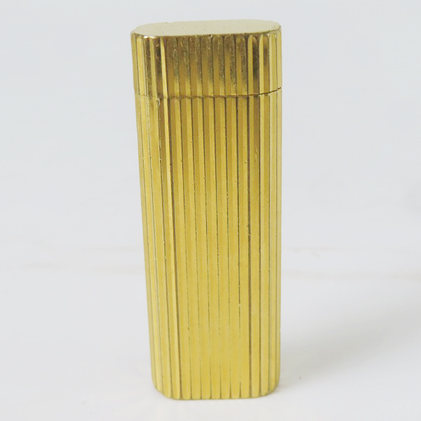 実際に弊社で買取させて頂いたCartier/カルティエ ガスライター ラウンド ゴールドカラーの画像 1枚目