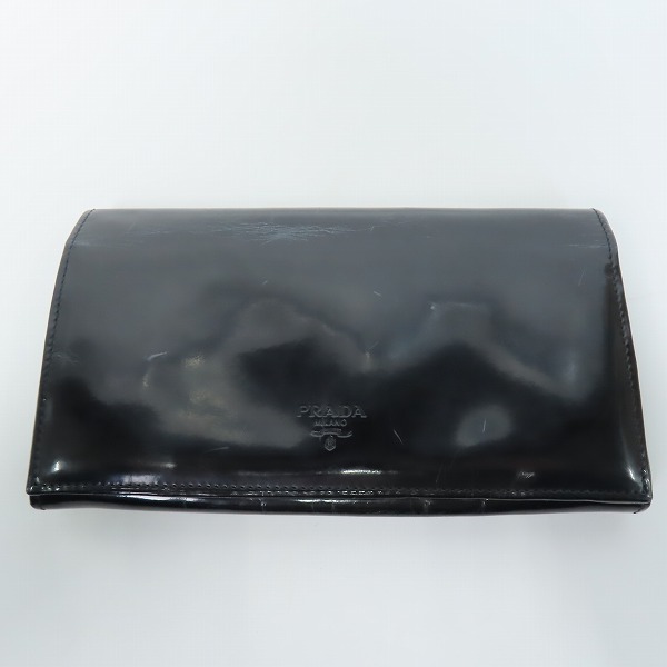 実際に弊社で買取させて頂いた【ギャラ付き】PRADA/プラダ レザー 二つ折り長財布 M608