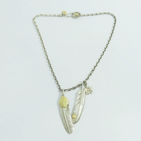 実際に弊社で買取させて頂いたFIRST ARROWS/ファーストアローズ 先金K18 フェザー/メディスンホイール/フラワー ペンダント チャーム ネックレス セットの画像 1枚目