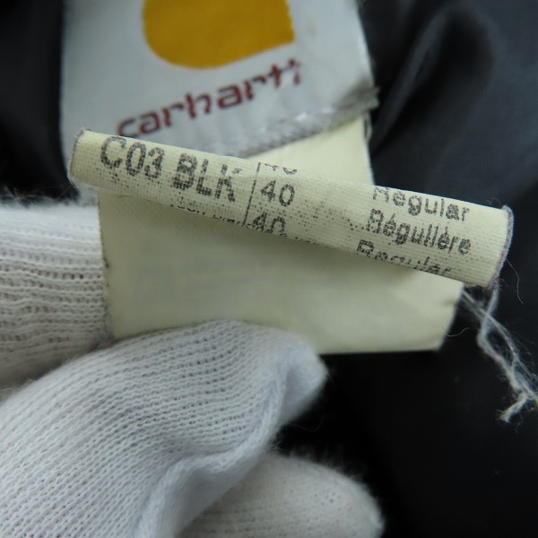 実際に弊社で買取させて頂いたCarhartt/カーハート USA製 Arctic Traditional Coat/カバーオール キルトライニング ダック地 ジャケット C03 BLK/40の画像 4枚目