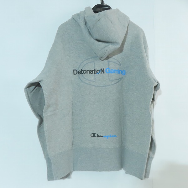実際に弊社で買取させて頂いた(2)【未使用】DNG DetonatioN Gaming × Champion/チャンピオン フーデッドスウェットパーカー C8-TE101/Lの画像 1枚目