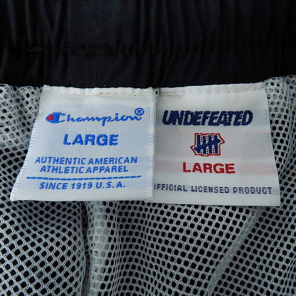 実際に弊社で買取させて頂いたChampion×UNDEFEATED/チャンピオン×アンディフィーテッド ナイロン パンツ C8-P211/Lの画像 2枚目