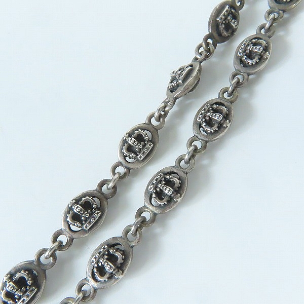 実際に弊社で買取させて頂いたJustin Davis/ジャスティンデイビス QE2 チェーン クラウンモチーフ SNJ120の画像 1枚目