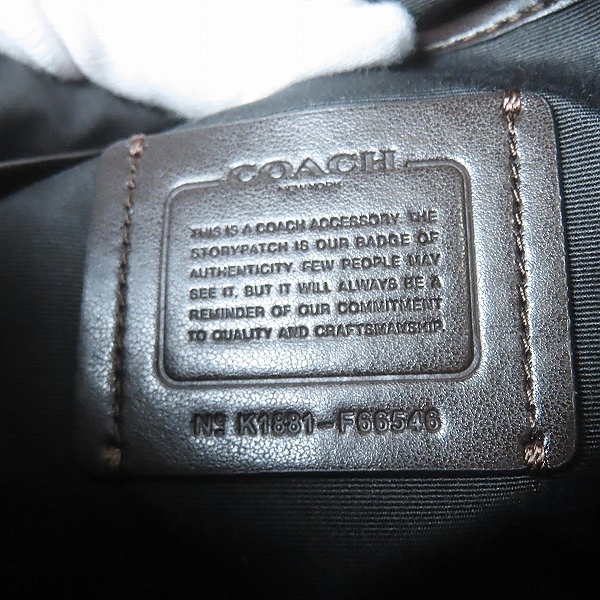 実際に弊社で買取させて頂いたCOACH/コーチ シグネチャー柄 PVCクラッチバッグ F66546の画像 4枚目