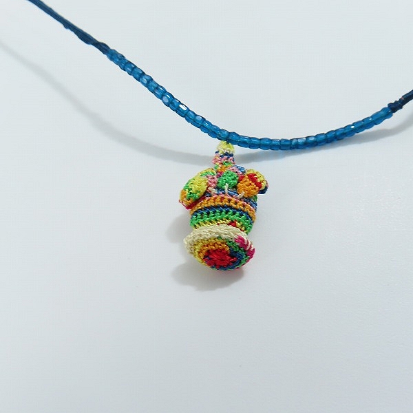 実際に弊社で買取させて頂いたUNDERCOVERISM/アンダーカバーイズム FFシルクネックレス O4N01 の画像 1枚目