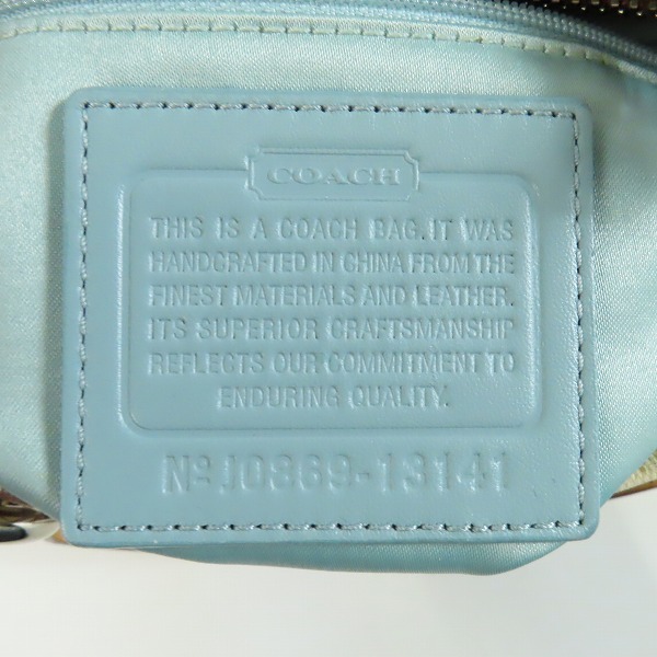 実際に弊社で買取させて頂いたCOACH/コーチ オプアート コーテッド キャンバス リアトート 2WAY ハンドバッグ/ショルダーバッグの画像 4枚目