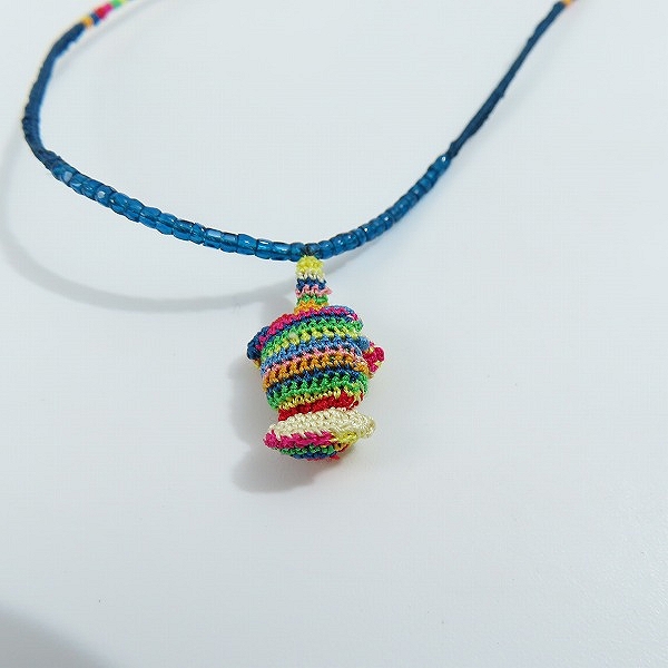 実際に弊社で買取させて頂いたUNDERCOVERISM/アンダーカバーイズム FFシルクネックレス O4N01 の画像 2枚目