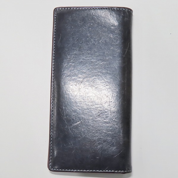 実際に弊社で買取させて頂いたcoach/コーチ 水牛レザー 55249B 二つ折り長財布 の画像 1枚目