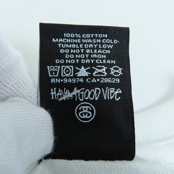 実際に弊社で買取させて頂いた【未使用】STUSSY/ステューシー ワールドツアー スプレー調 プリントTシャツ 半袖カットソー ホワイト Mの画像 3枚目