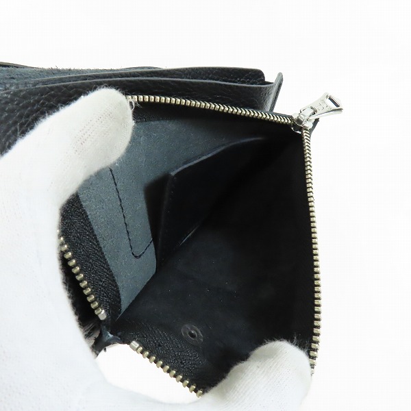 実際に弊社で買取させて頂いたCALEE/キャリー レザーストラップ付き 2つ折り財布の画像 5枚目