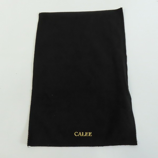 実際に弊社で買取させて頂いたCALEE/キャリー レザーストラップ付き 2つ折り財布の画像 8枚目