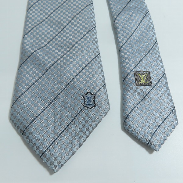 実際に弊社で買取させて頂いたLOUIS VUITTON/ルイヴィトン LVロゴ チェック柄 シルク100％ネクタイの画像 1枚目