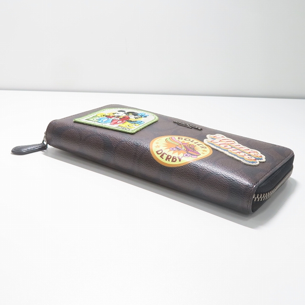 実際に弊社で買取させて頂いたCOACH×Disney/コーチ×ディズニー 長財布 シグネチャー柄 ワッペン刺繍 F31350の画像 2枚目