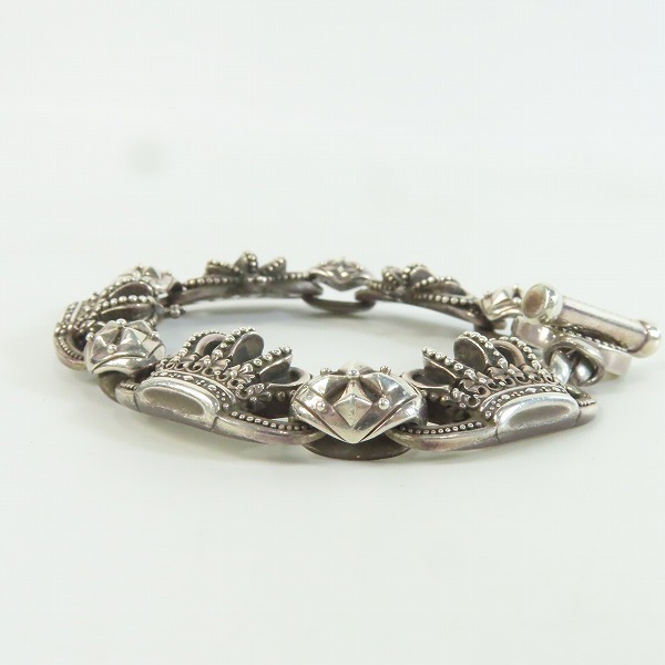 実際に弊社で買取させて頂いた【ギャラ付き】JUSTIN DAVIS/ジャスティンデイビス SMALL QE2 BRACELET クラウンブレスレット SBJ118の画像 2枚目