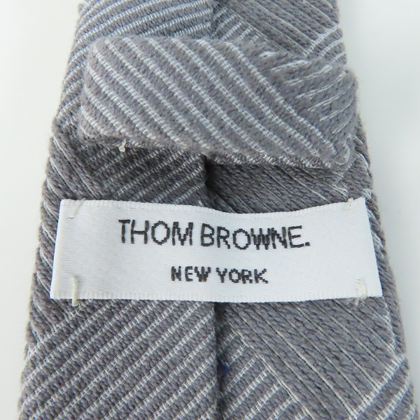 実際に弊社で買取させて頂いたTHOM BROWNE/トムブラウン 錨/いかり総柄 ネクタイ の画像 1枚目