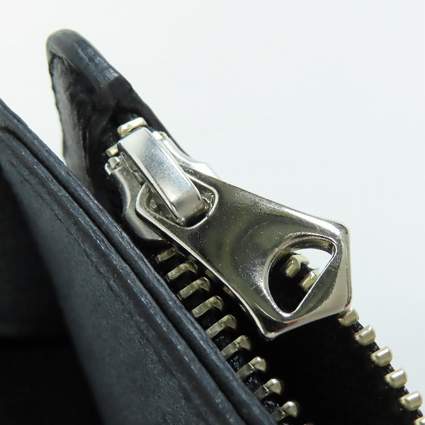 実際に弊社で買取させて頂いたCALEE/キャリー レザーストラップ付き 2つ折り財布の画像 7枚目