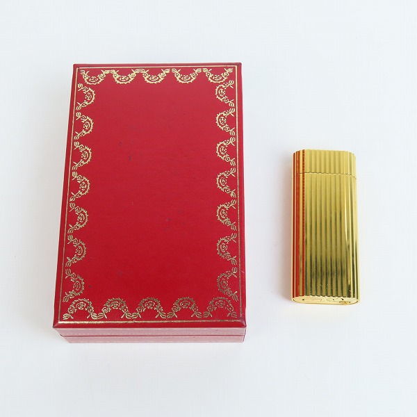 実際に弊社で買取させて頂いたCartier/カルティエ ガスライター ラウンド ゴールドカラー ストーン付きの画像 8枚目