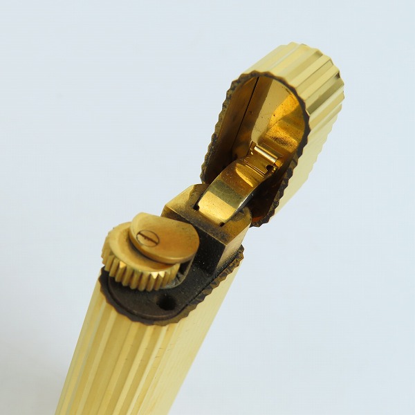 実際に弊社で買取させて頂いたCartier/カルティエ ガスライター ラウンド ゴールドカラー ストーン付きの画像 7枚目