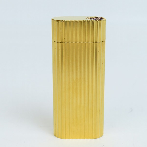 実際に弊社で買取させて頂いたCartier/カルティエ ガスライター ラウンド ゴールドカラー ストーン付き