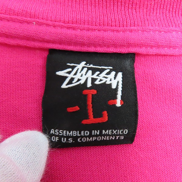 実際に弊社で買取させて頂いたSTUSSY/ステューシー INTERNATIONAL STUSSY TRIBE バックプリント Ｔシャツ ピンク/Ｌの画像 2枚目