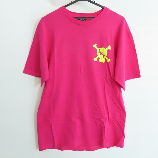 実際に弊社で買取させて頂いたSTUSSY/ステューシー INTERNATIONAL STUSSY TRIBE バックプリント Ｔシャツ ピンク/Ｌの画像 0枚目