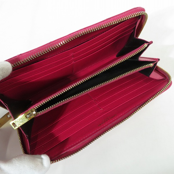 実際に弊社で買取させて頂いたSAINT LAURENT PARIS/サンローランパリ カサンドラロゴプレート ラウンドジップ ロングウォレット/長財布の画像 4枚目