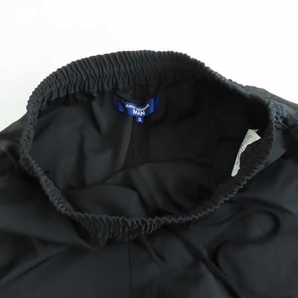 実際に弊社で買取させて頂いたJUNYA WATANABE MAN×COMME des GARCONS HOMME/ジュンヤワタナベマン×コムデギャルソン  ポリエステル ギャバパンツ WL-P030 Sの画像 2枚目