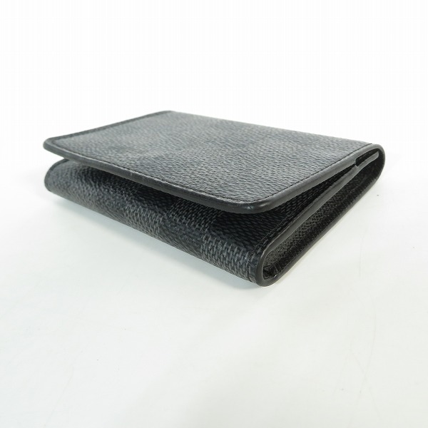 実際に弊社で買取させて頂いた【難あり】LOUIS VUITTON/ルイヴィトン ダミエグラフィット アンヴェロップ カルト ドゥ ヴィジット カードケース N63338の画像 2枚目