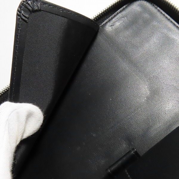 実際に弊社で買取させて頂いたEMPORIO ARMANI/エンポリオアルマーニ ロゴ総柄 ラウンドジップ長財布の画像 6枚目