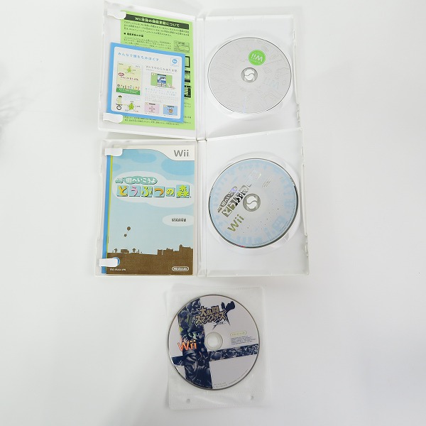 実際に弊社で買取させて頂いた任天堂/Nintendo/ニンテンドー Wii 本体 RVL-001 ソフト 3点/リモコン 2個/ヌンチャク付き【簡易動作確認済】の画像 7枚目