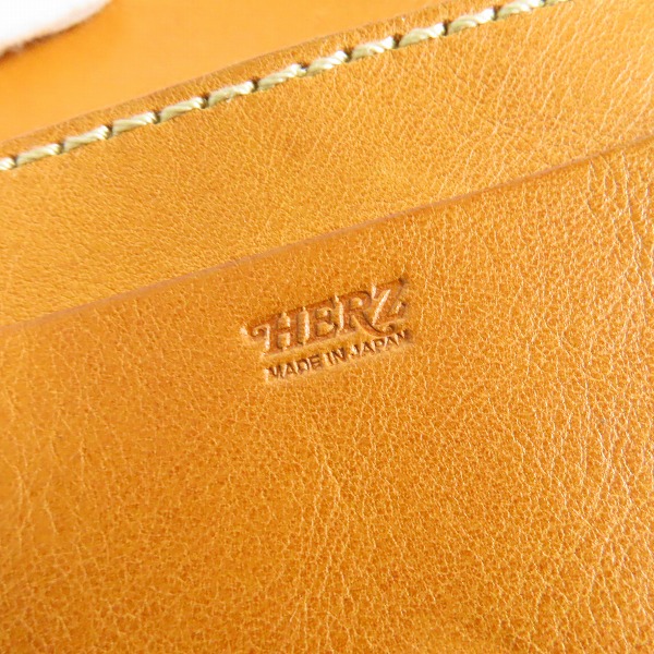実際に弊社で買取させて頂いたHERZ/ヘルツ レザー 二つ折り長財布 キャメルの画像 4枚目