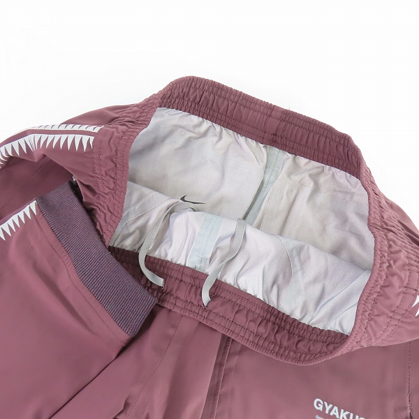 実際に弊社で買取させて頂いたNIKE × UNDERCOVER/ナイキ×アンダーカバー Gyakusou Team/ギャクソウ  ナイロントラックパンツ 842794-210/Lの画像 2枚目