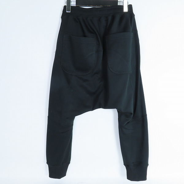 実際に弊社で買取させて頂いたCOMME des GARCONS JUNYA WATANABE MAN/コムデギャルソンジュンヤワタナベマン サルエルパンツ AD2021 WI-P011 XSの画像 1枚目