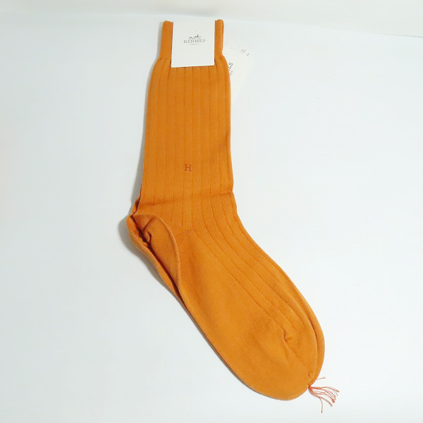 実際に弊社で買取させて頂いた【未使用】HERMES/エルメス 靴下 ソックス オレンジの画像 1枚目