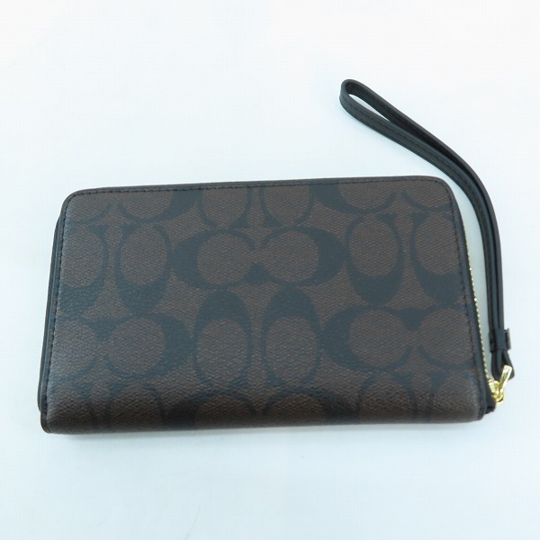 実際に弊社で買取させて頂いたCOACH/コーチ シグネチャー ラウンドジップウォレット F57468の画像 1枚目