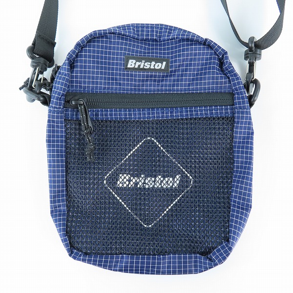 実際に弊社で買取させて頂いたF.C.Real Bristol/F.Cレアルブリストル フロントメッシュポーチ チェック FCRB-210090