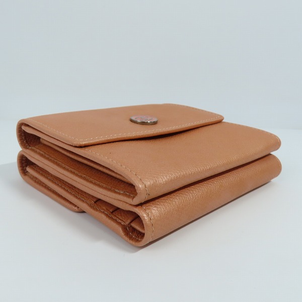 実際に弊社で買取させて頂いたCHANEL/シャネル ココボタン Ｗホック レザー 二つ折り財布 コンパクトウォレットの画像 2枚目