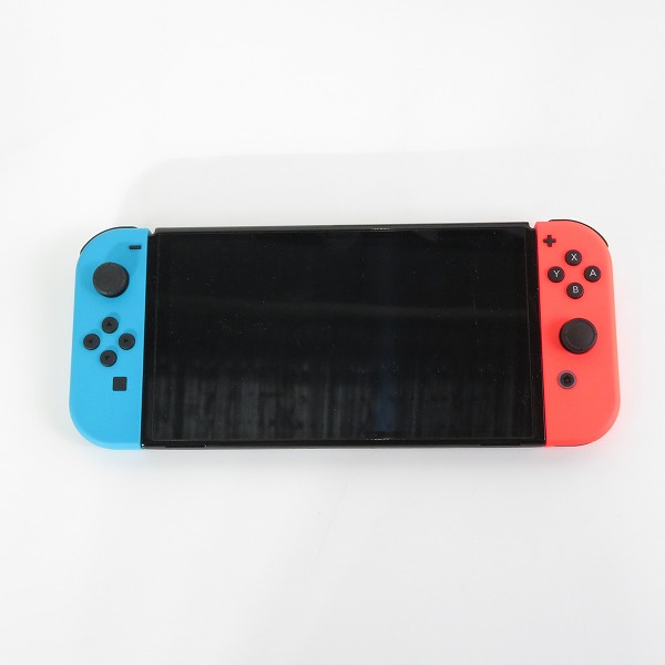 実際に弊社で買取させて頂いた任天堂 Nintendo Switch/ニンテンドースイッチ 有機ELモデル 本体 HEG-001/ホリ グリップコントローラー ブルー付きの画像 1枚目