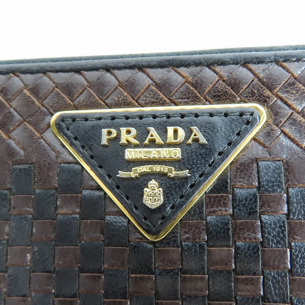 実際に弊社で買取させて頂いた【難有り】PRADA/プラダ MADRAS マドラス 編込みレザー L字ファスナー 長財布/1M0506の画像 4枚目