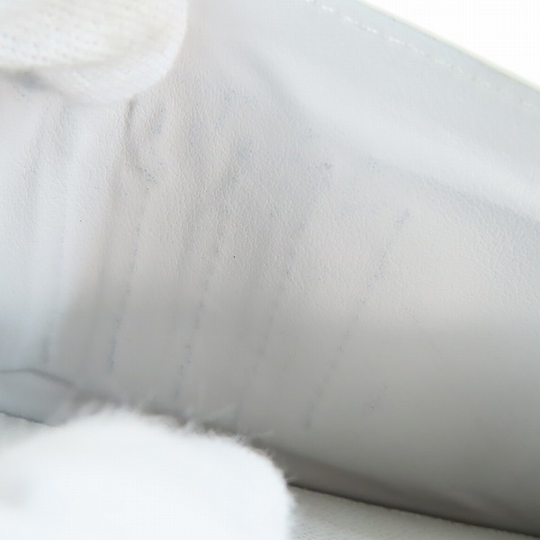 実際に弊社で買取させて頂いたLOUIS VUITTON/ルイヴィトン ポルトフォイユ ブラザ モノグラムキャンバス タイガラマ ホワイト ポルトフォイユ 二つ折り長財布の画像 7枚目