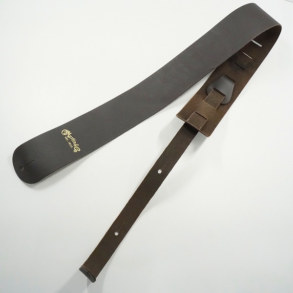 実際に弊社で買取させて頂いたMartin/マーティン ダークブラウン レザー調 アコースティックギター用 ギターストラップの画像 1枚目