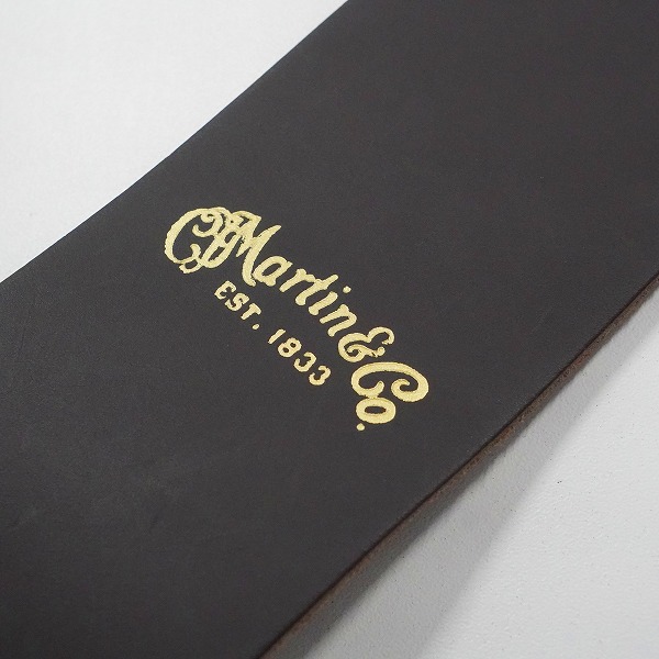 実際に弊社で買取させて頂いたMartin/マーティン ダークブラウン レザー調 アコースティックギター用 ギターストラップの画像 2枚目
