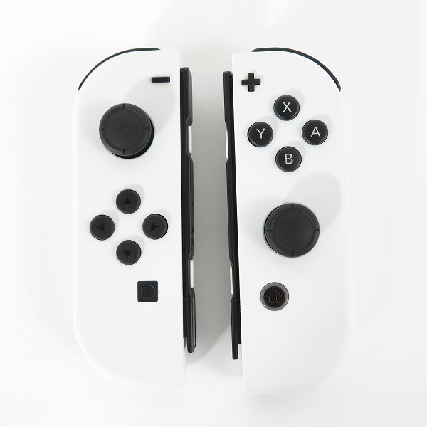 実際に弊社で買取させて頂いた任天堂 Nintendo Switch/ニンテンドースイッチ Joy-Con ホワイト HAC-015/016 グリップ付き【簡易動作確認済】の画像 1枚目