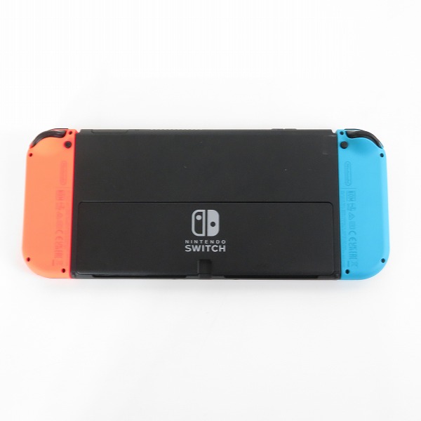実際に弊社で買取させて頂いた任天堂 Nintendo Switch/ニンテンドースイッチ 有機ELモデル 本体 HEG-001/ホリ グリップコントローラー ブルー付きの画像 2枚目