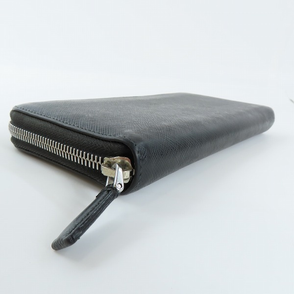 実際に弊社で買取させて頂いたPRADA/プラダ サフィアーノレザー ロゴ ラウンドジップ長財布の画像 2枚目