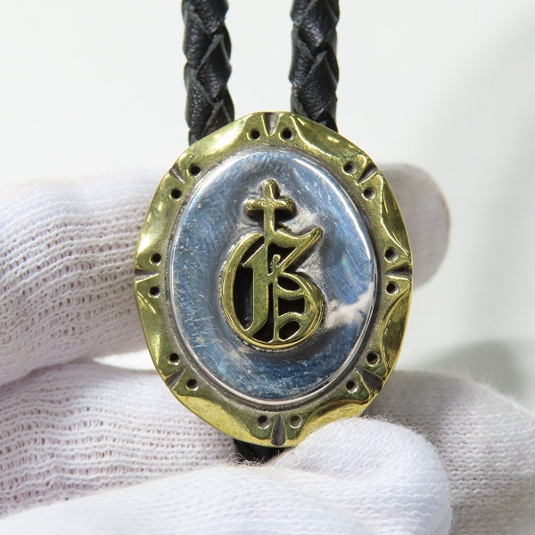 実際に弊社で買取させて頂いたGANGSTERVILLE×Galcia/ギャングスタービル×ガルシア G ループタイ/ボロタイ/ブラス/シルバーの画像 1枚目