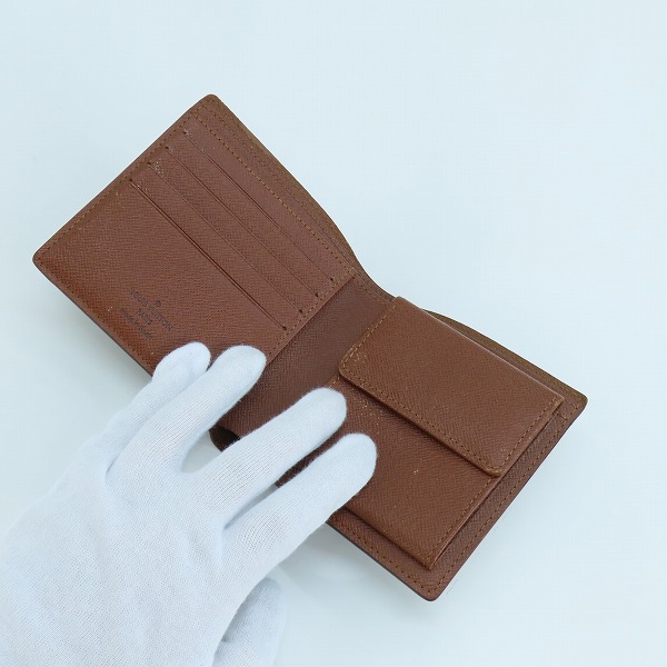 実際に弊社で買取させて頂いたLOUIS VUITTON/ルイヴィトン ポルトフォイユ・マルコ 二つ折り財布 モノグラム M61675の画像 3枚目